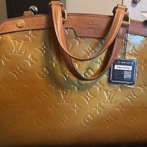 Louis Vuitton patent leather yellow purse
